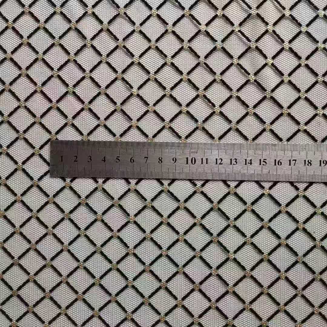 热销款无弹网眼布六角网底布菱形植绒印金 闪亮款裙装等面料 现货
