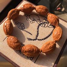 厂家供应橄榄核雕刻观音手串 双面雕刻橄榄核佛珠 橄榄油核手串