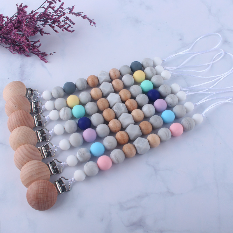 Bebé chupete anti-gota cadena bebé juguete de silicona chupete clip anti-gota banda Chew música anti-perdido cadena Nuevo