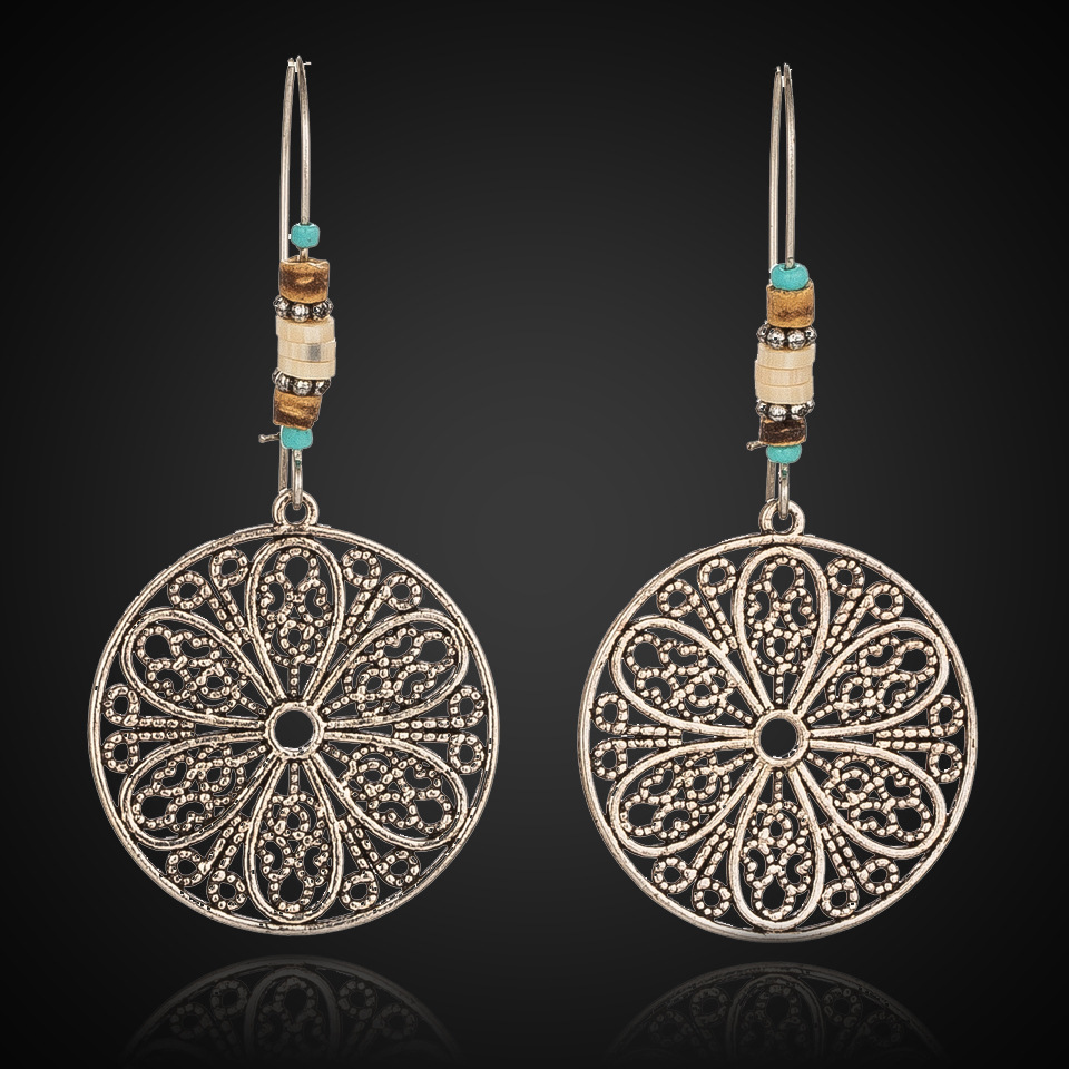 Retro Old Hollow Round Flower Alloy Long Earrings display picture 2