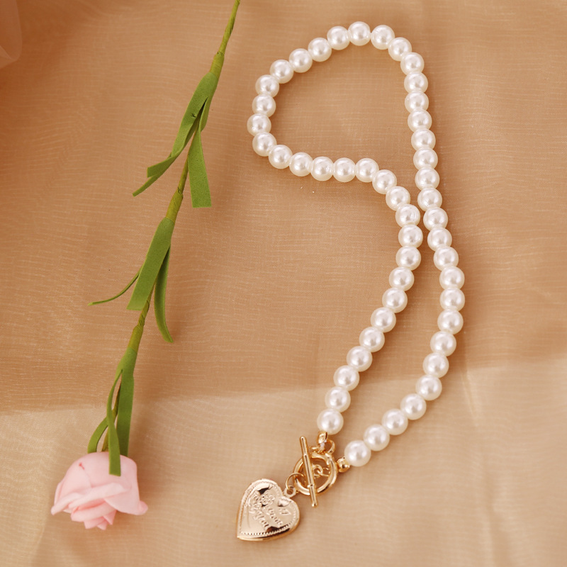 Retro Open Heart Shape Pearl Necklace display picture 13