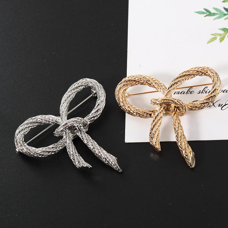 Simple Style Bow Knot Alloy Plating Women's Brooches display picture 3
