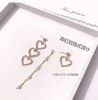 Asymmetrical cute universal earrings from pearl with tassels, ear clips heart-shaped heart shaped