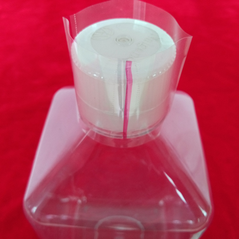 厂家包装食品级透明PVC瓶口收缩膜 带易撕拉线瓶盖密封热缩膜-阿里巴巴