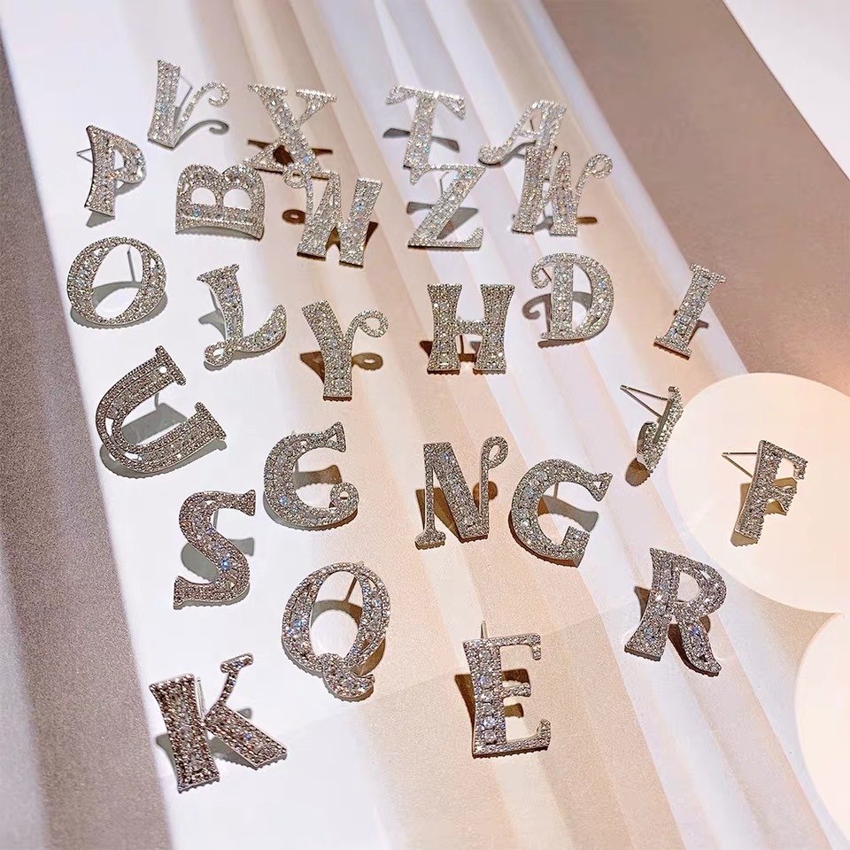 copper earrings with letters with zircon