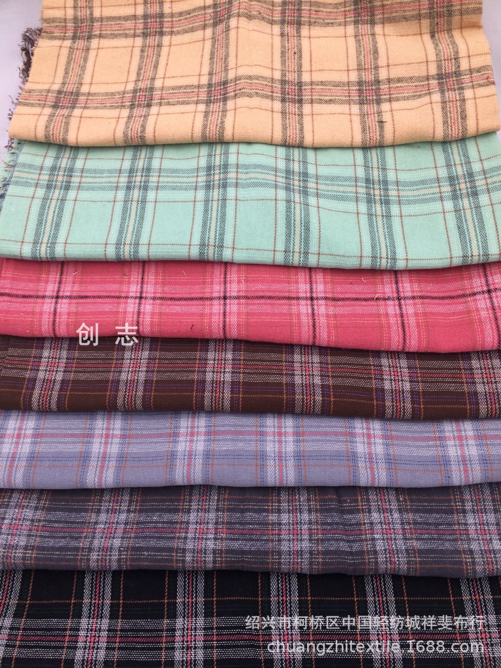 色织斜纹潮流格子磨毛面料女装秋冬衬衫布淘现货织布厂轻纺城