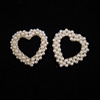 Accessory from pearl, earrings heart shaped