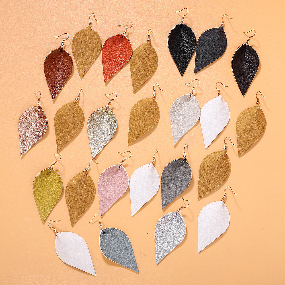 2019 Croix-frontière Vente Chaude En Cuir Feuille Boucles D'oreilles Unique Ornement Accessoires Européen Et Américain Nouveau Boucles D'oreilles Pendentif En Stock En Gros display picture 2