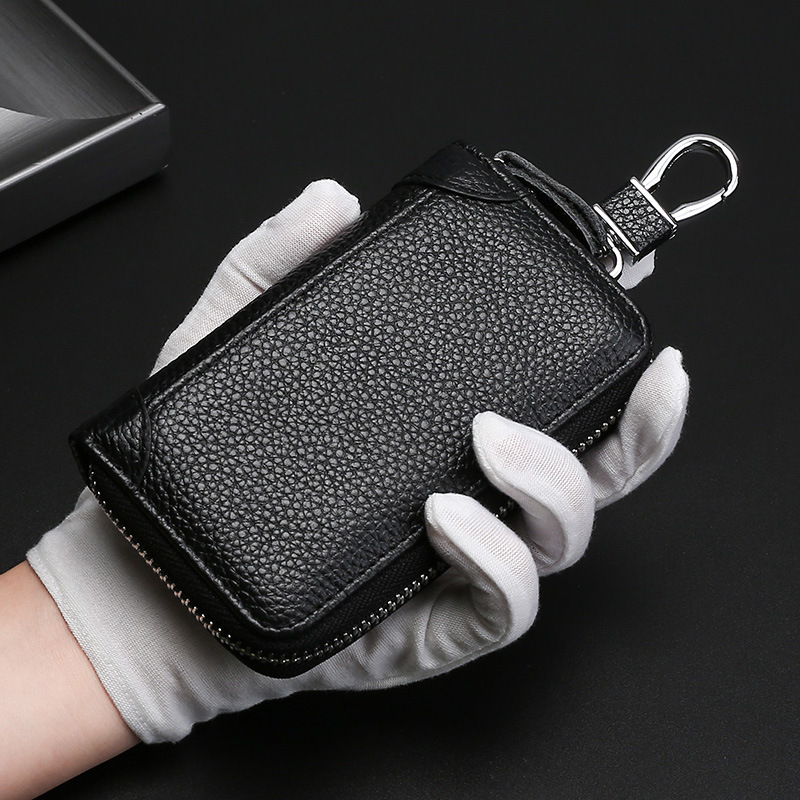Caja de llave de cuero genuino Cremallera de los hombres al por mayor multifuncional caja de la llave del coche Personalización de llavero de cuero genuino de negocios de las mujeres