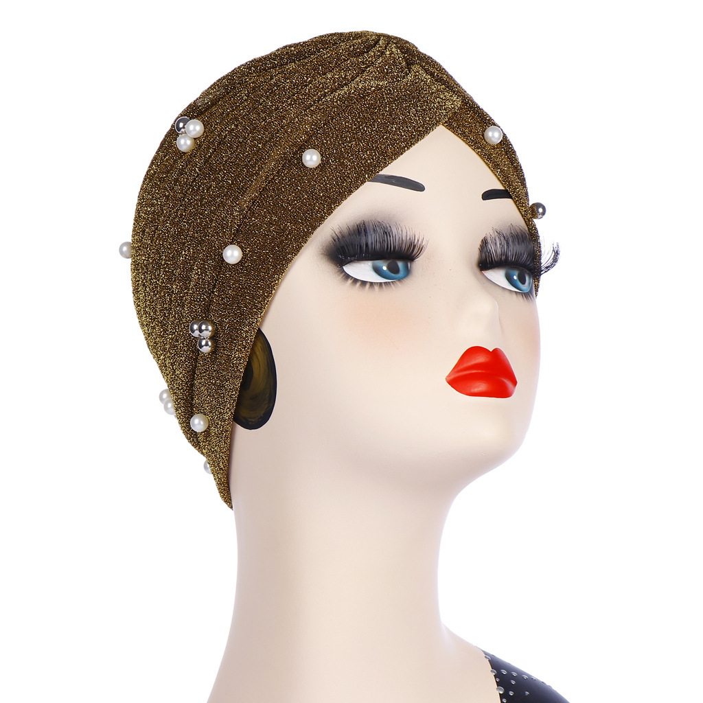 Muslim head cap in gold