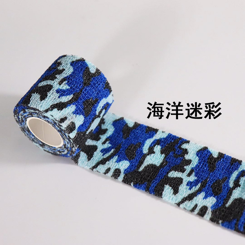 Fábrica sin pegamento cinta de camuflaje telescópica autoadhesiva tela no tejida caza al aire libre caza camuflaje cinta de montar