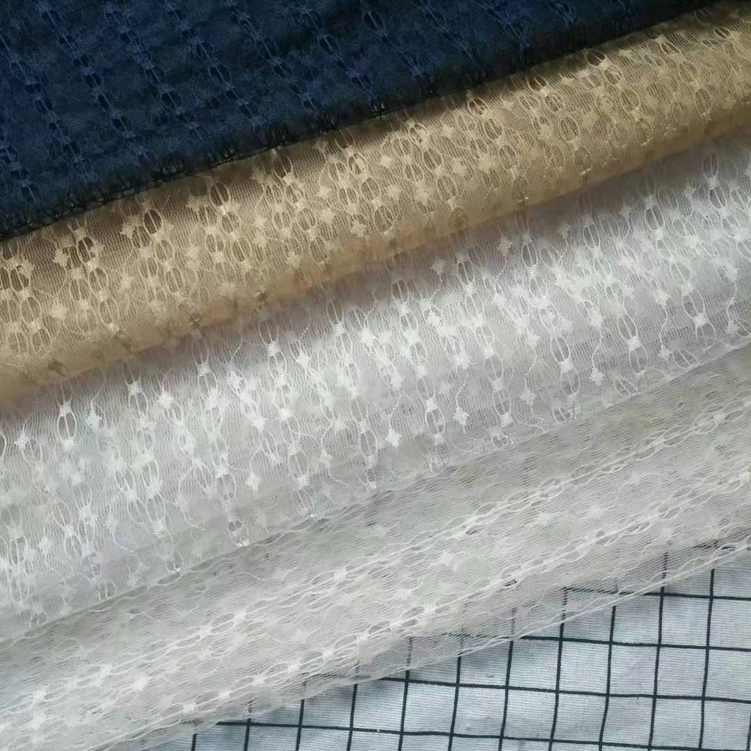 新款爆款全锦无弹镂空提花网布波浪直条 清新童装时装面料现货