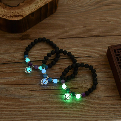 Yiwu direct deal European style Elastic force men and women luminescence Bracelet natural Weathered stone Beading Hand string