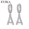 Fashionable earrings with letters, big zirconium, micro incrustation