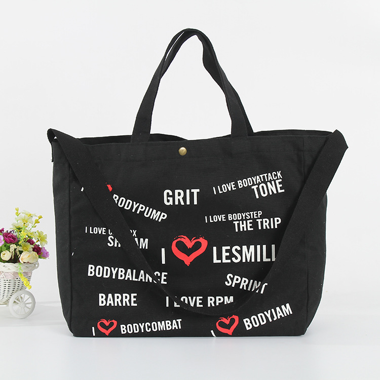 创意按扣式黑色帆布袋定做环保全棉帆布手提袋定制创意广告棉布袋