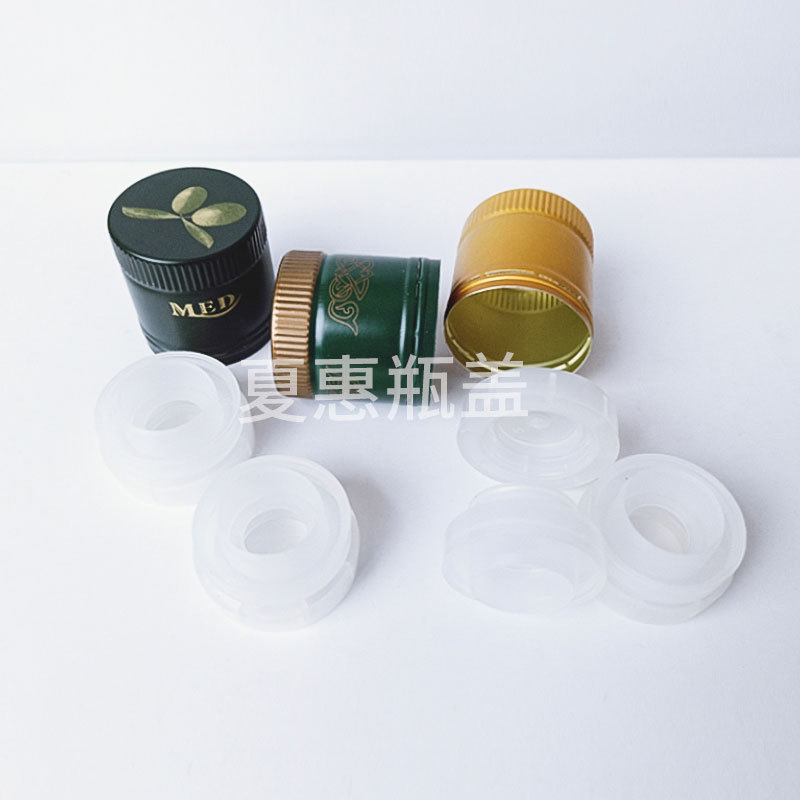Los fabricantes suministran Xianhui cubierta de metal botella de vidrio redonda cubierta de aceite de oliva multicolor patrón de logotipo de producción de muestra opcional image 4
