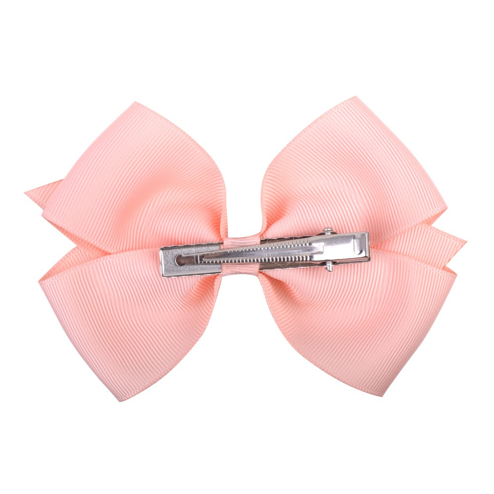 Fashion Simple Children's Solid Color Ribbed Bow Hair Accessories display picture 1