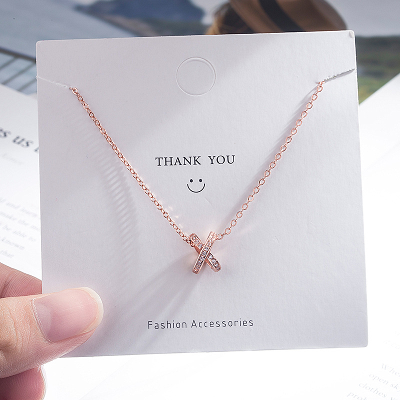 Three dimensional small design necklace with letters