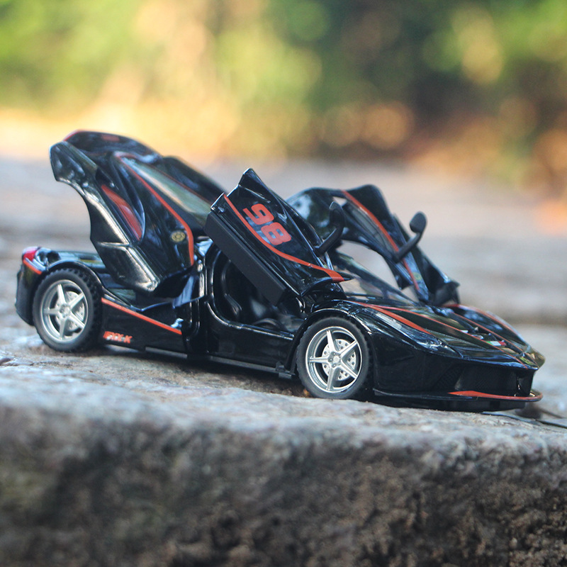 Jiaye rojo FX versión de pista modelo de coche de aleación Tire hacia atrás sonido y luz coche de juguete puerta coche deportivo 32164 en caja