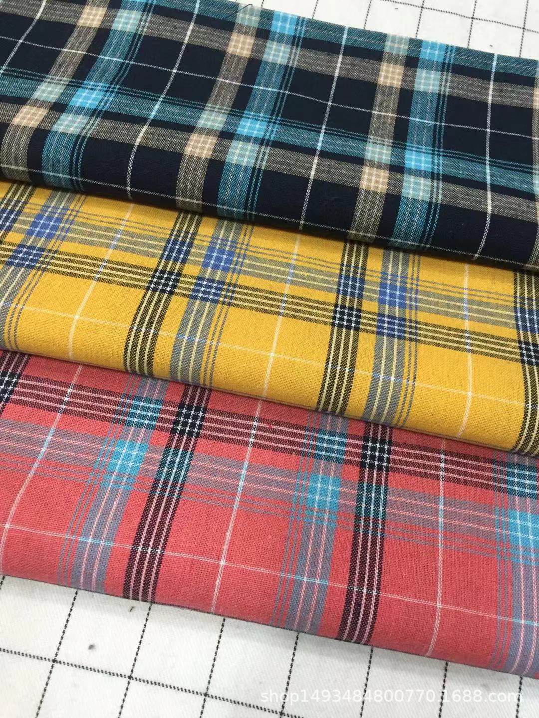 厂家直销 色织梭织布春装面料 涤棉混纺格子 爆款女装面料 童装