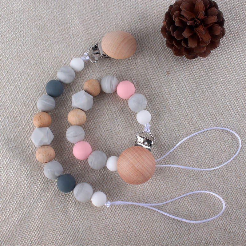 Bebé chupete anti-gota cadena bebé juguete de silicona chupete clip anti-gota banda Chew música anti-perdido cadena Nuevo