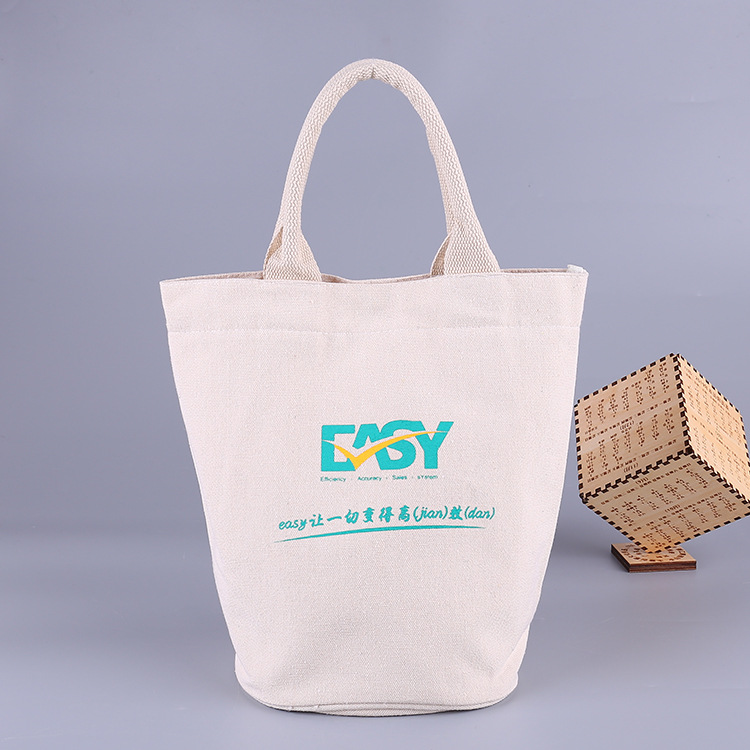 通用帆布手提单肩包 时尚水桶购物袋 休闲纽扣收纳帆布袋可印logo