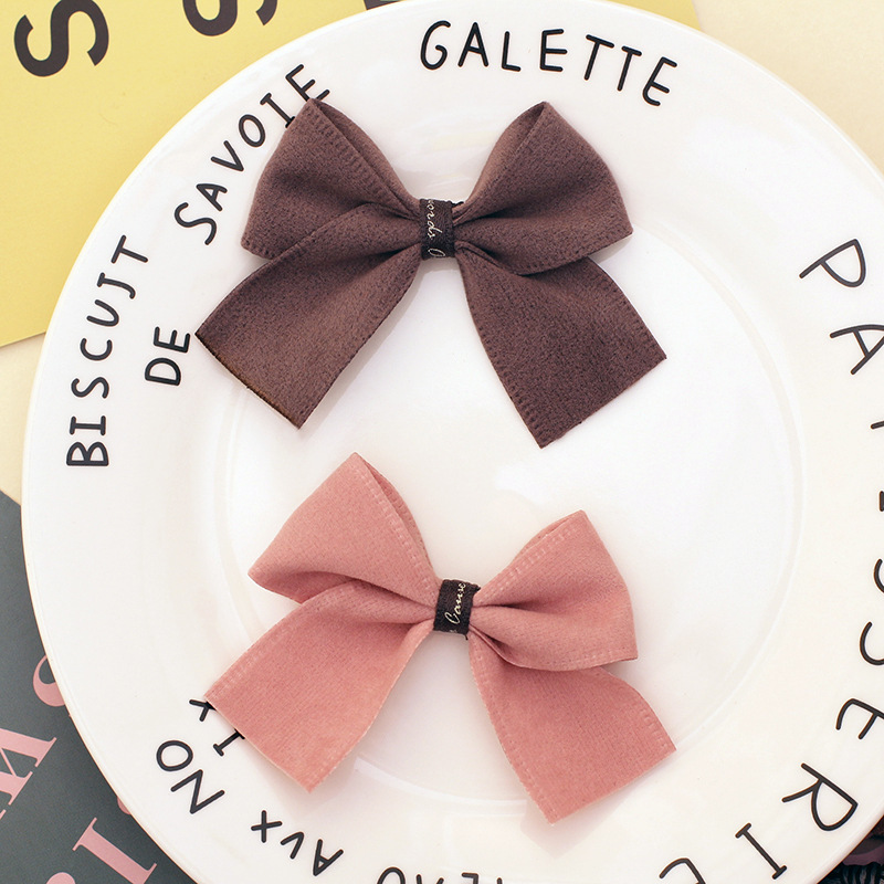 毛呢布料蝴蝶结1