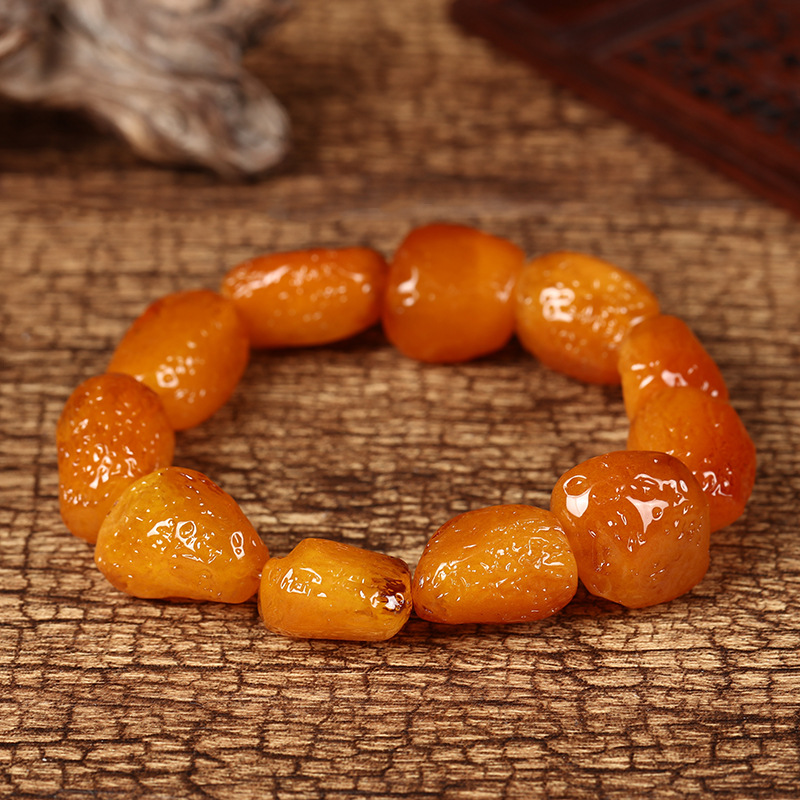 【廠家直銷】二代琥珀蜜蠟原石隨行手串帶皮松香味浮水熒光男女款