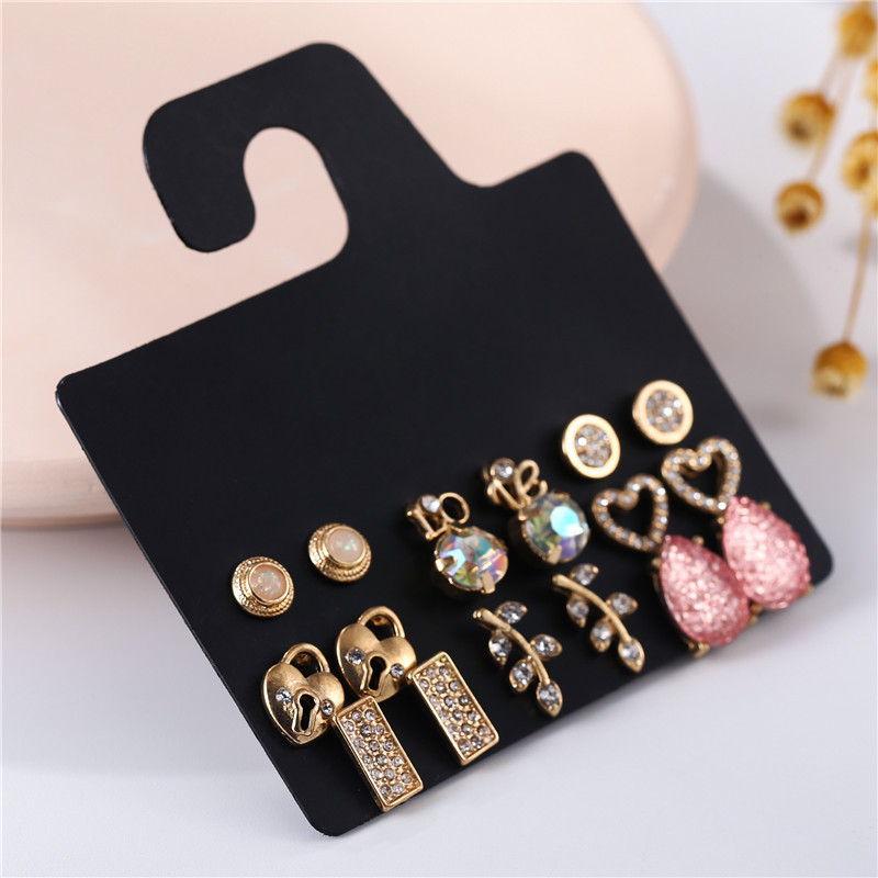 Korean Temperament Fresh Pink Gypsophila Diamonds Love Leaves Lock Geometric Earrings  Wholesale Nihaojewelry display picture 5