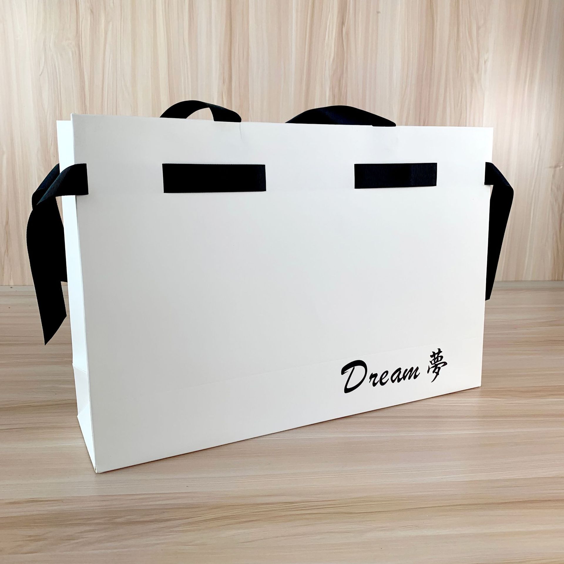 厂家直营高档服装纸袋定做环保礼品购物包装广告手提袋印刷logo