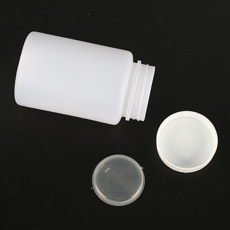 Venta al por mayor engrosada 500ml botella líquida de plástico redonda botella de polvo laboratorio Boca Grande sub-embalaje botella de boca ancha botella de cebo