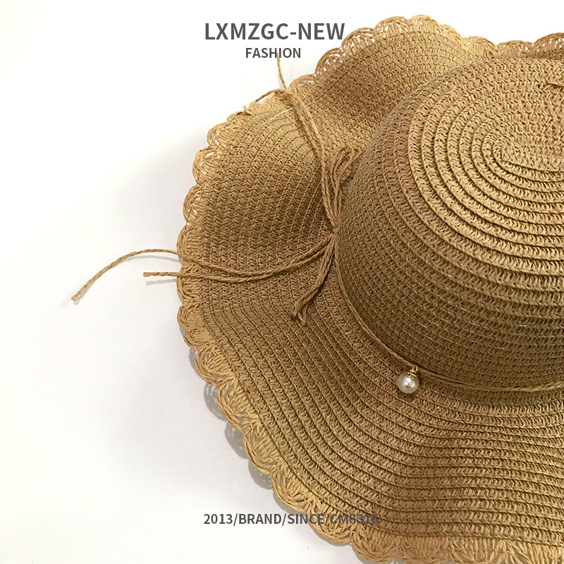 New Summer Straw Hat Ladies Korean Beach Vacation Beach Pearl Lace Bow Sun Hat display picture 2