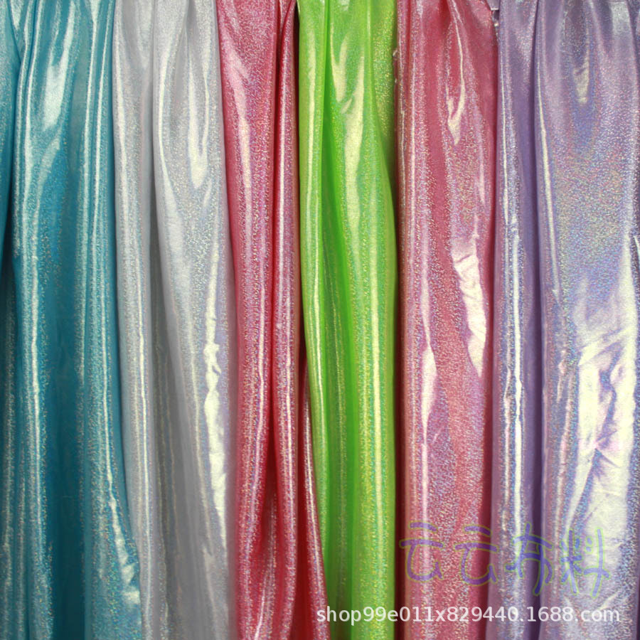 镭射幻彩布七彩点针织满版烫金布料舞台背景服装面料装饰彩色布料
