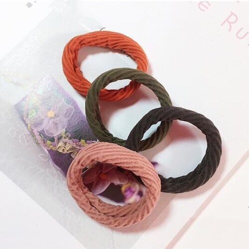 Manufacturer wholesale Korean bold high-elastic jacquard towel ring seamless and durable headband hair rope rubber band leather sheath hair ring