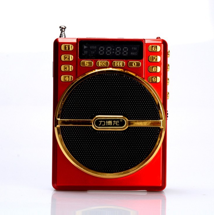Xianba A202 loudspeaker an elderly person plugging in the radio