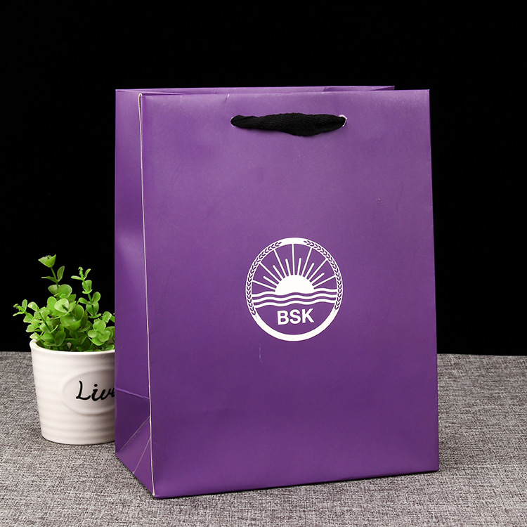 创意广告购物纸袋 定做白卡纸服装手提袋 礼品包装袋定制