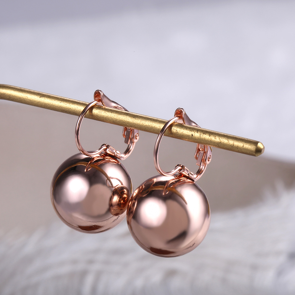 Simple Creative Ball Shaped Metal Copper Earrings Wholesale display picture 4