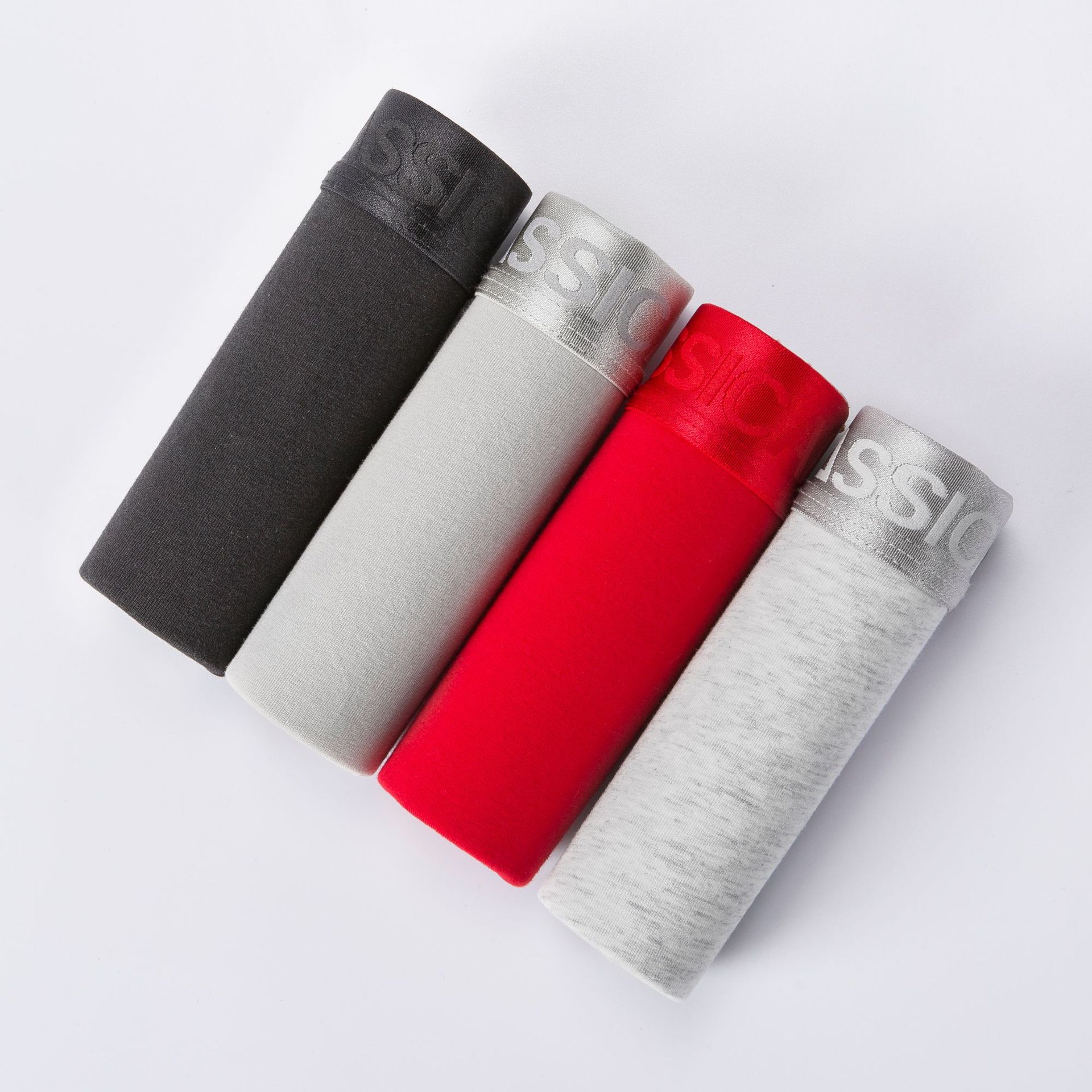 Fabricantes de ropa interior para hombres populares de color sólido ropa interior de algodón boxers en caja pantalones cortos calzoncillos de cabeza boxeadores al por mayor transfronterizos