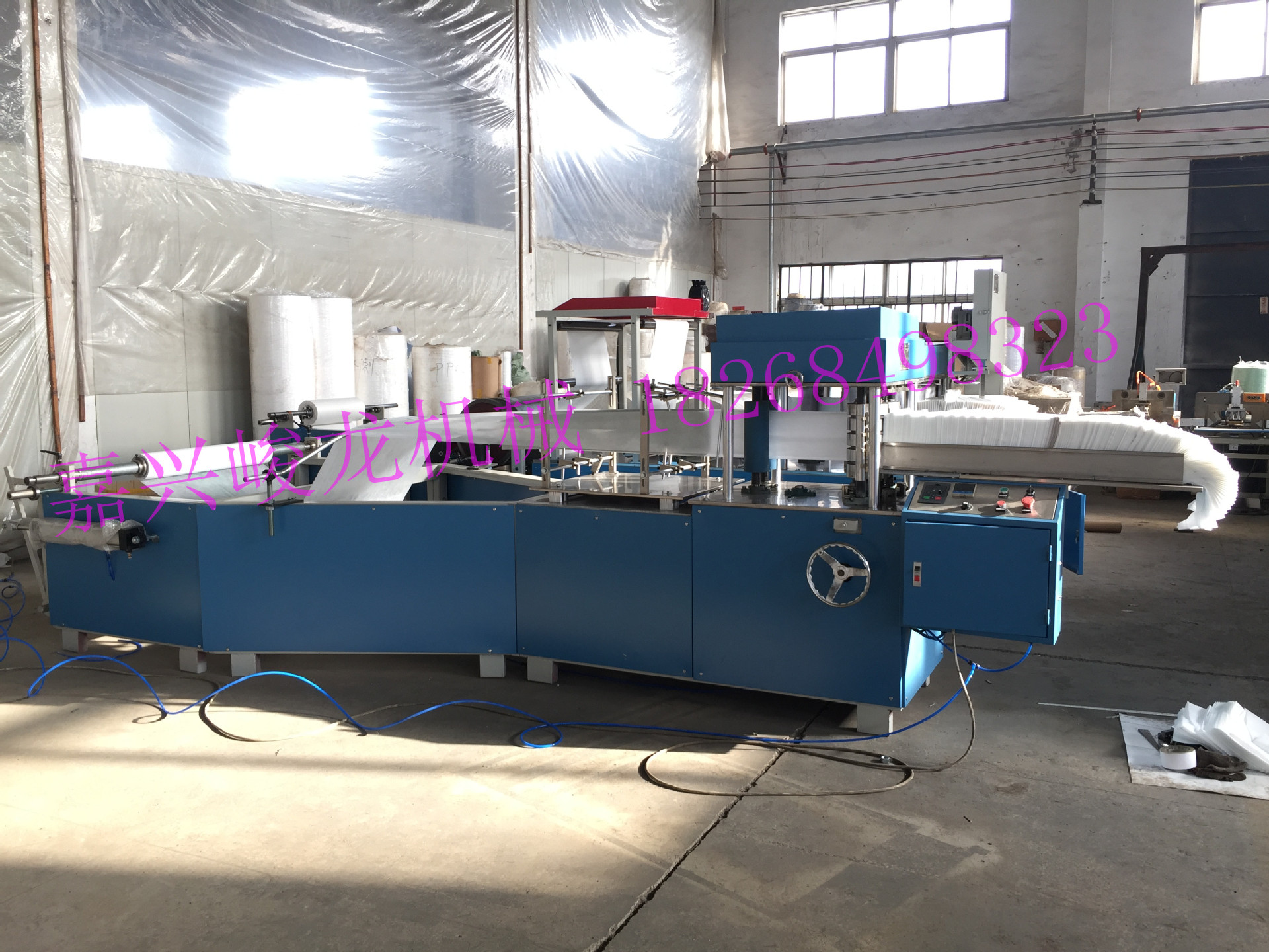 全自动一次性美容床单打线折叠机   一次性无纺布铺单折叠裁切机