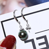 Fashionable earrings from pearl, silver 925 sample