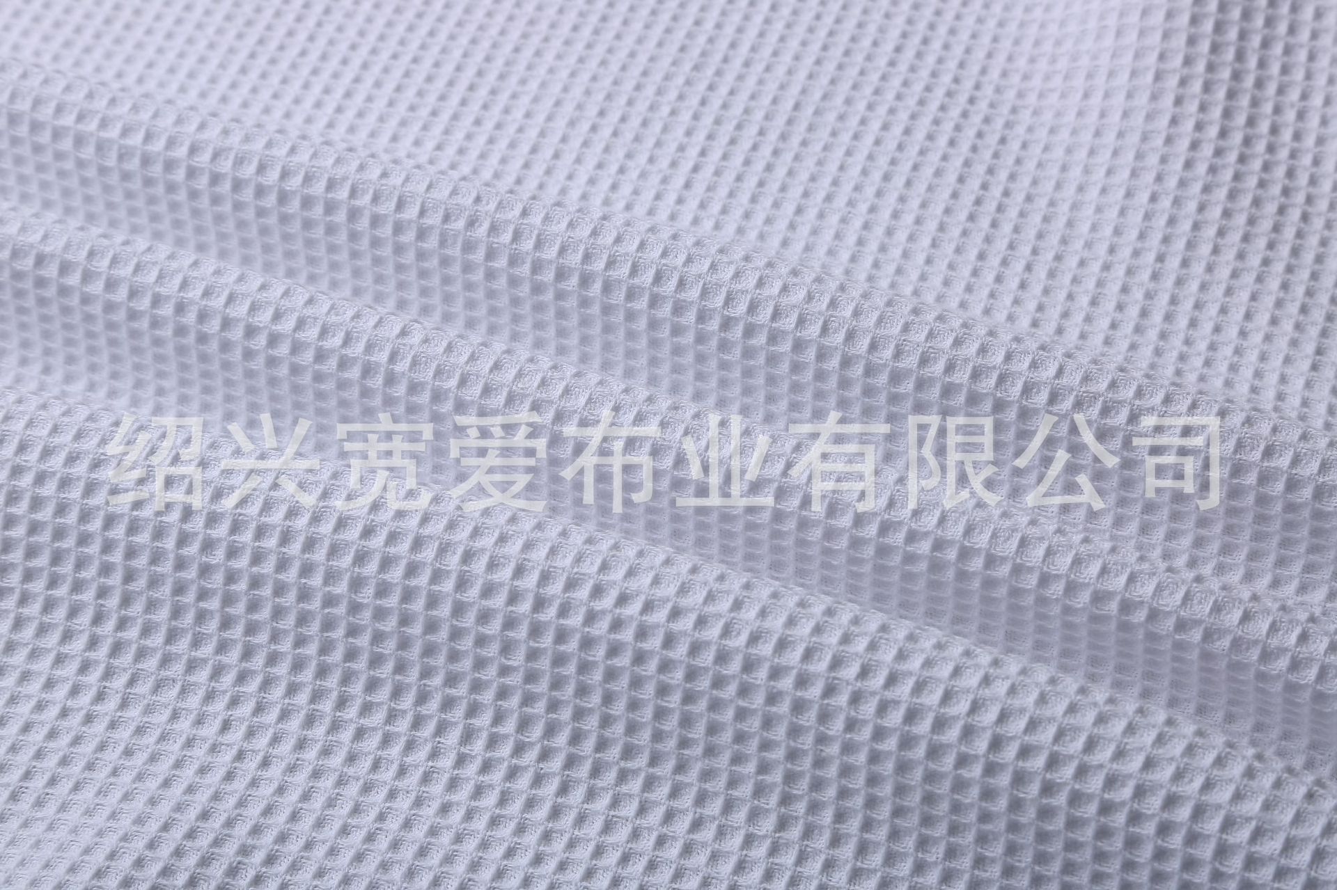 现货供应230克华夫格滴塑面料 厂家直销浴袍面料批发 防滑面料
