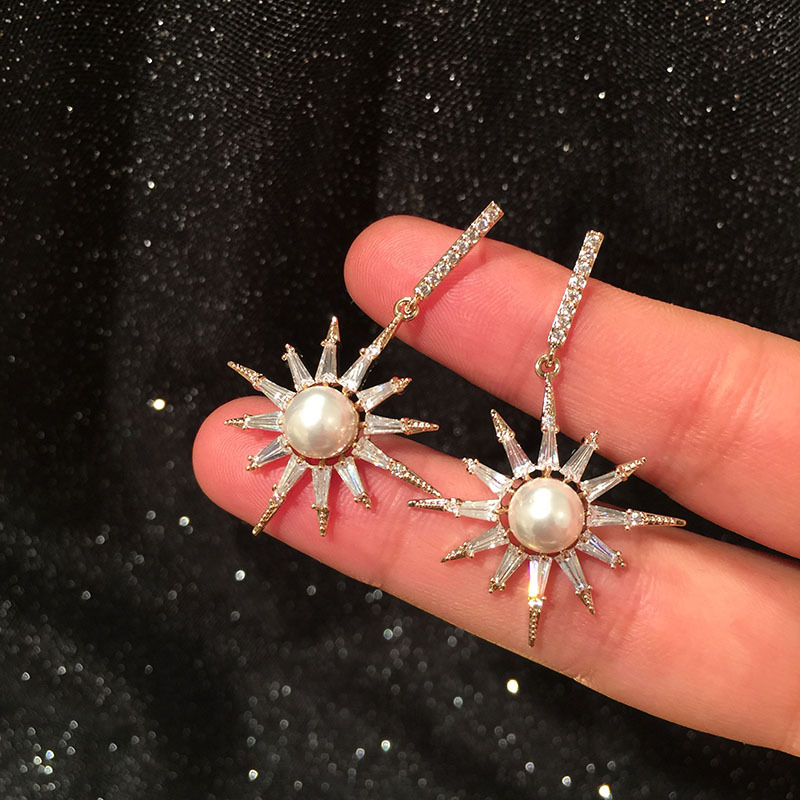 S925 Silver Korean Fashion Eight-bell Star Earrings Micro-set Zircon Luxury Pearl Sun Flower Earrings display picture 4