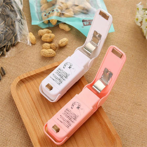Mini small sealing machine food preservation plastic bag sealer hand pressure heat sealing machine bag sealing clip