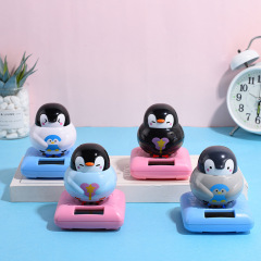 創意太陽能搖擺企鵝搖頭公仔汽車擺件 卡通兒童玩具禮物外貿批發