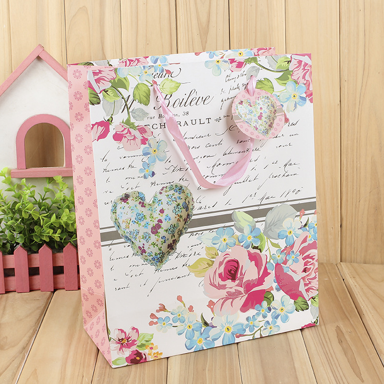 牛皮纸袋定做礼品手提袋订做白卡服装袋商务礼物袋定制印刷logo