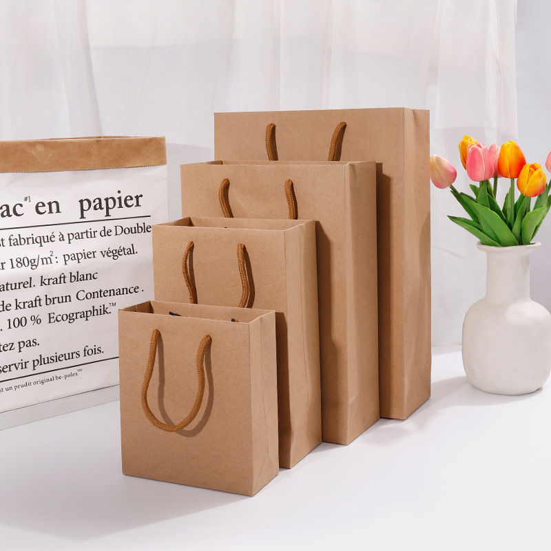 Wholesale vintage kraft paper handbags, gift bags, shopping clothing paper bags, packaging bags, large quantity discount