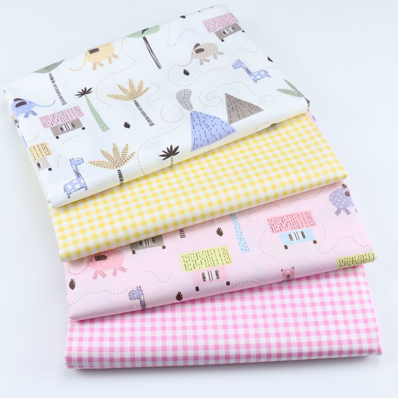 韩版卡通小象长颈鹿印花纯棉布 宝宝纯棉罩衣防晒衣包被面料批发