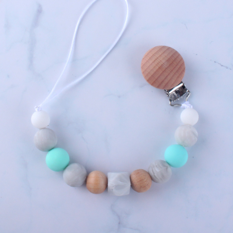 Bebé chupete anti-gota cadena bebé juguete de silicona chupete clip anti-gota banda Chew música anti-perdido cadena Nuevo