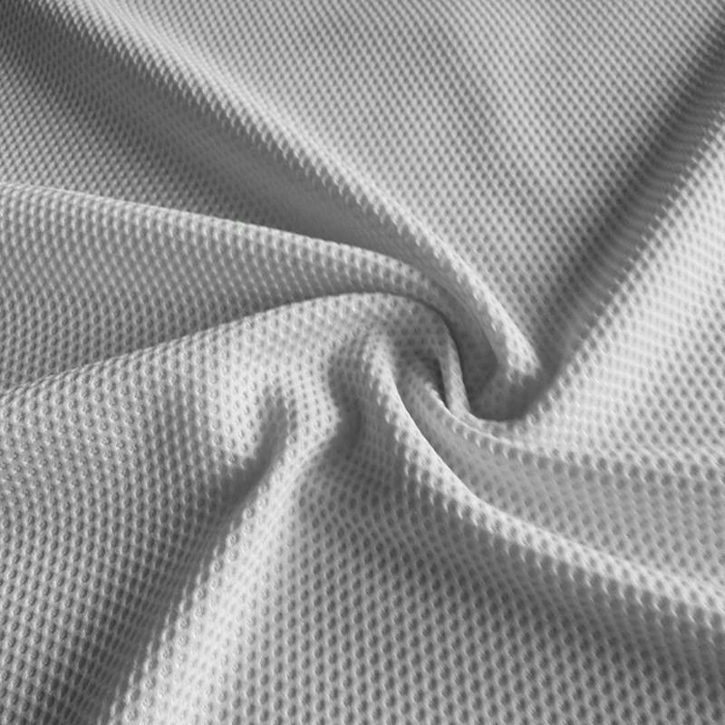 厂家供应压孔提花莱卡 经编弹力莱卡布 运动休闲服装手套面料