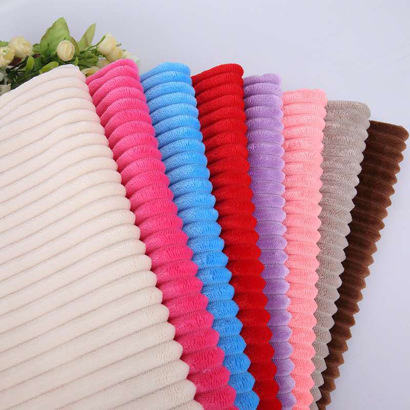 厂家直销 全涤单面K条绒 剪花抽条法兰绒 现货供应毛绒玩具面料